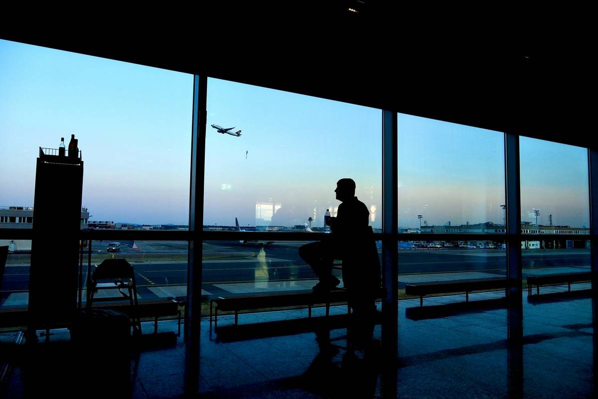 Traveler rushing through airport terminal missing flight due to missed patch rules